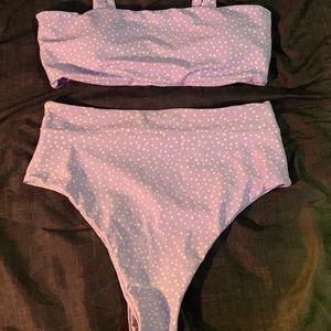 Purple bathing suit with white polka dots!